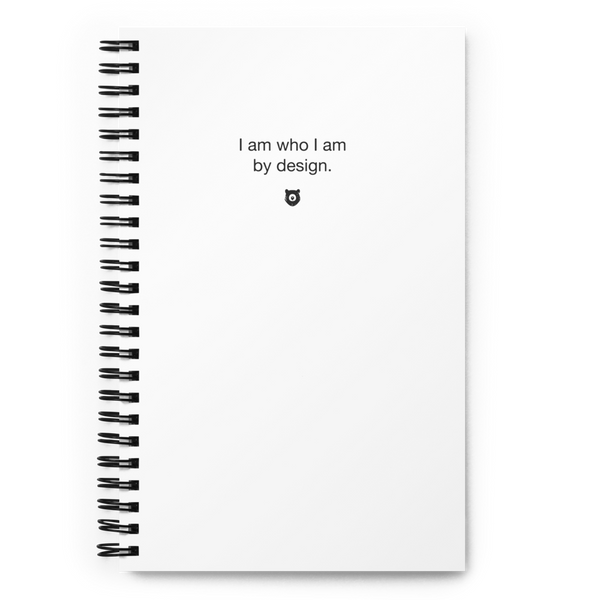 "I am who I am by design." Notebook